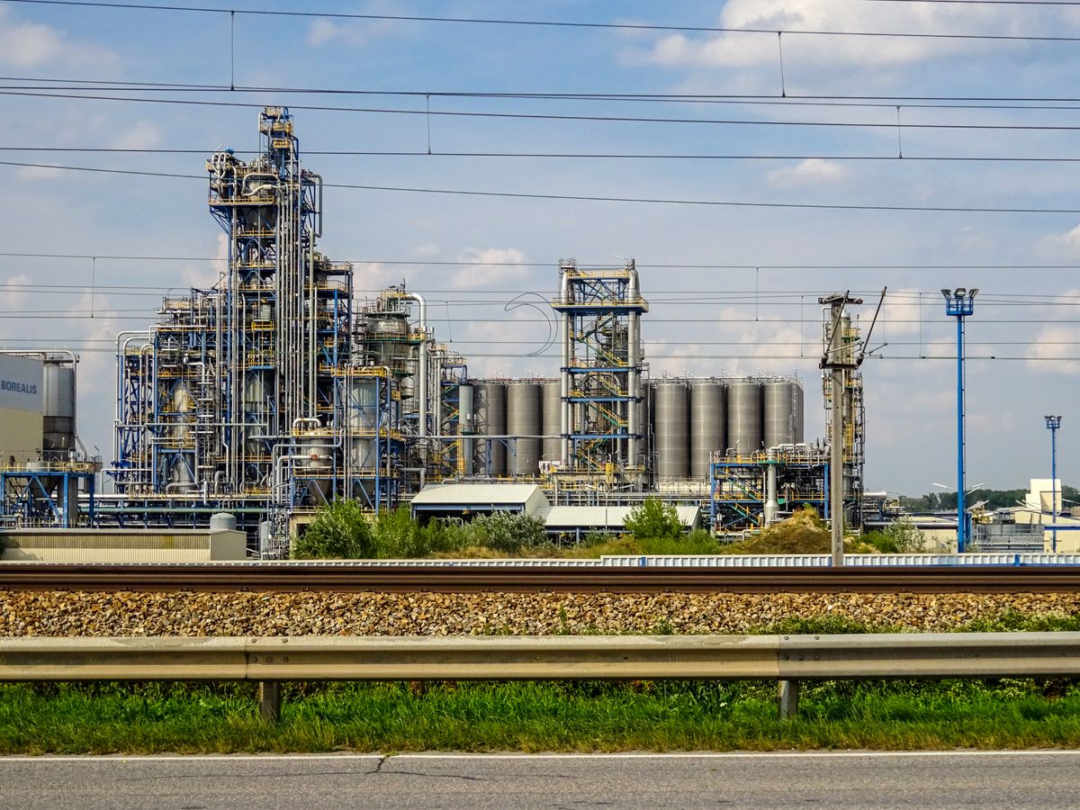 Chemical processing plant with pipework and towers